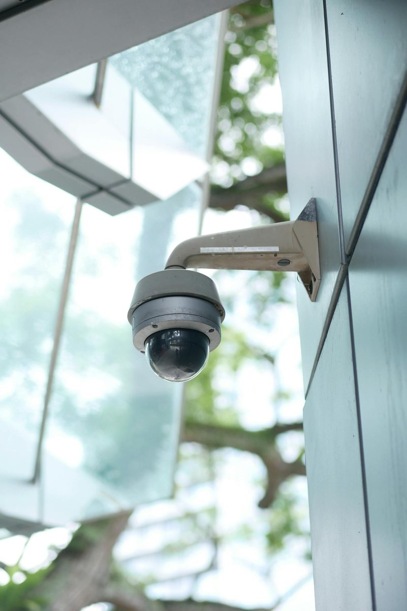 High-tech surveillance camera installed on a modern building.